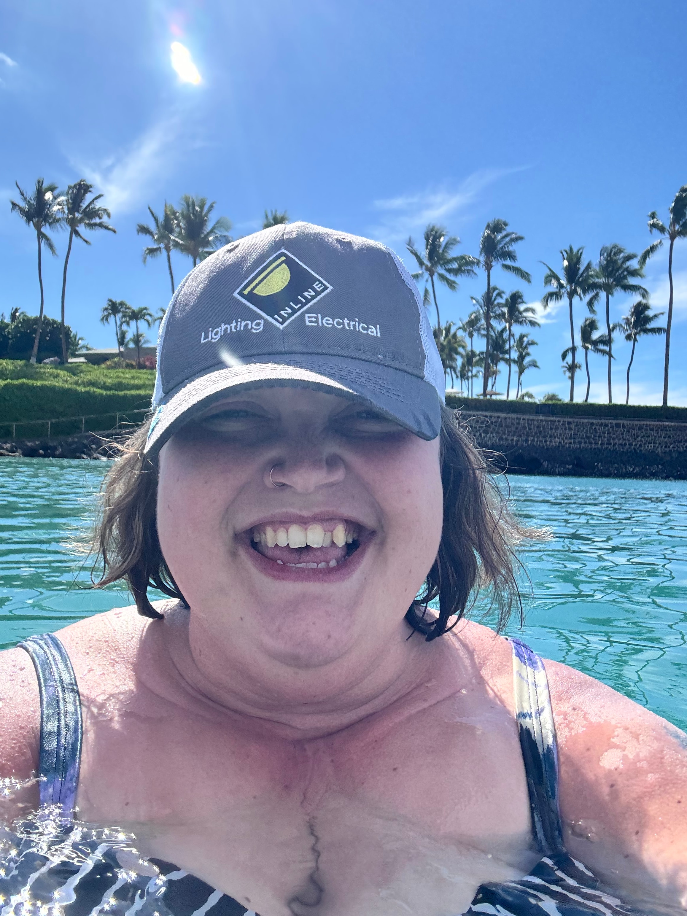 Chelsea Holmes enjoying a day at the pool — living life fully despite chronic illness